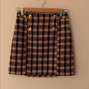 Pink plaid skirt with gold buttons